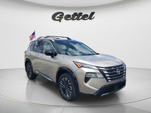 Champagne Silver Metallic/Super Black 2026 Nissan Rogue Platinum