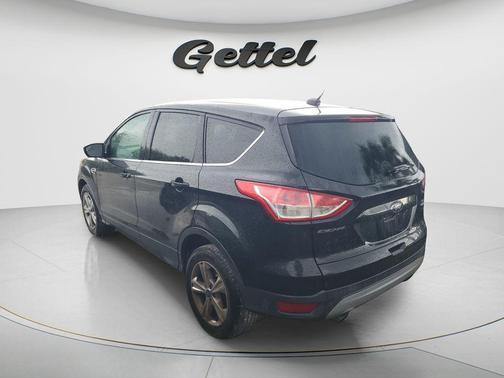 Ruby Red Metallic Tinted Clearcoat 2015 Ford Escape SE