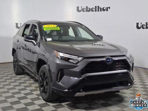 Silver Sky Metallic/Midnight Black Metallic 2023 Toyota RAV4 Hybrid SE
