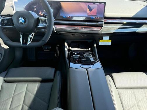 Black Sapphire Metallic 2027 BMW 540 i xDrive