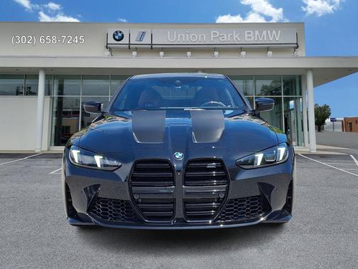 Black Sapphire Metallic 2025 BMW M4 Competition xDrive
