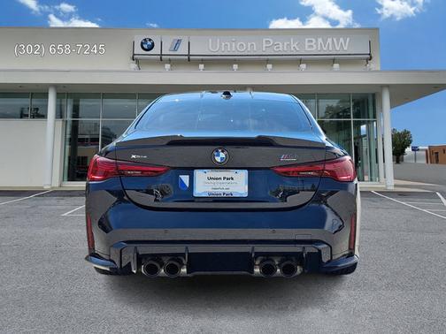 Black Sapphire Metallic 2025 BMW M4 Competition xDrive