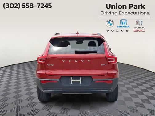 Fusion Red Metallic 2023 Volvo XC40 Plus Dark Theme