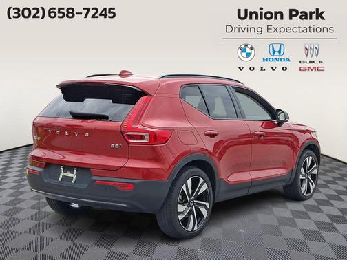 Fusion Red Metallic 2023 Volvo XC40 Plus Dark Theme