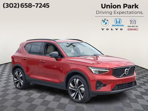 Fusion Red Metallic 2023 Volvo XC40 Plus Dark Theme