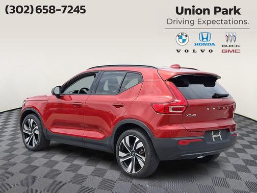 Fusion Red Metallic 2023 Volvo XC40 Plus Dark Theme