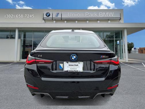 Black Sapphire Metallic 2024 BMW i4 Gran Coupe M50