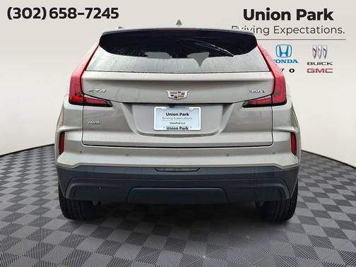Latte Metallic 2024 Cadillac XT4 AWD Luxury