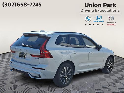 Crystal White Metallic - 707 2024 Volvo XC60 Core Dark Theme