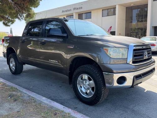 Sandy Beach Metallic 2010 Toyota Tundra Grade