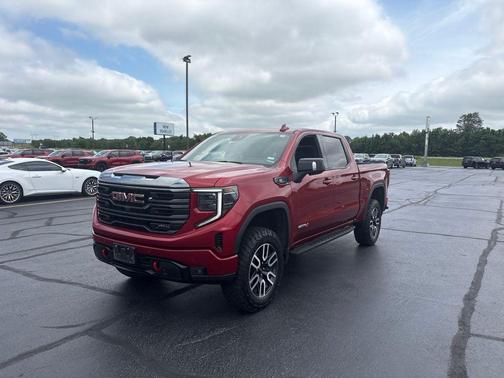 Volcanic Red Tintcoat 2024 GMC Sierra 1500 AT4