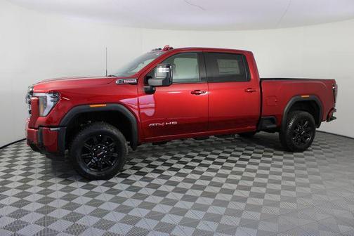 Volcanic Red Tintcoat 2026 GMC Sierra 3500 AT4