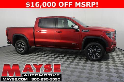 Volcanic Red Tintcoat 2026 GMC Sierra 1500 AT4
