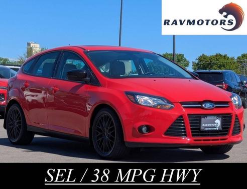 Red 2012 Ford Focus SEL