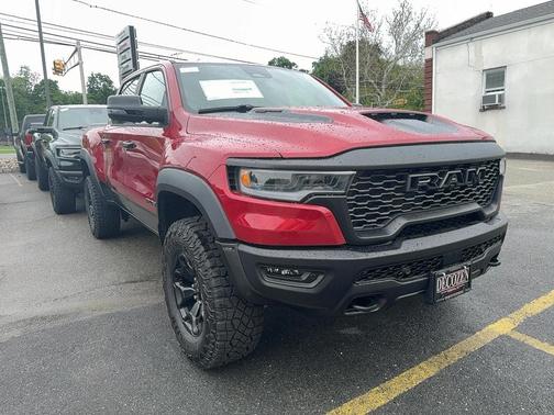 Red 2026 RAM 1500 RHO Crew Cab 4x4 5'7' Box