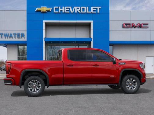 Volcanic Red Tintcoat 2026 GMC Sierra 1500 AT4