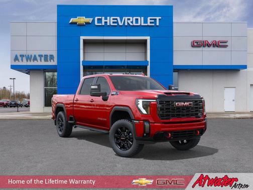 Volcanic Red Tintcoat 2026 GMC Sierra 3500 AT4