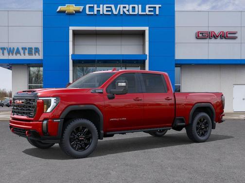 Volcanic Red Tintcoat 2026 GMC Sierra 3500 AT4