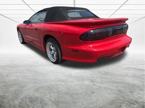 Red 1995 Pontiac Firebird Trans Am