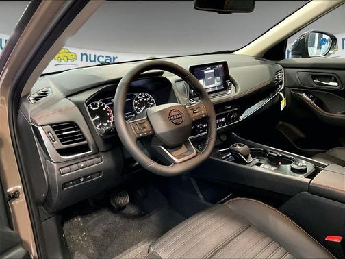 Beige/tan 2026 Nissan Rogue Rock Creek