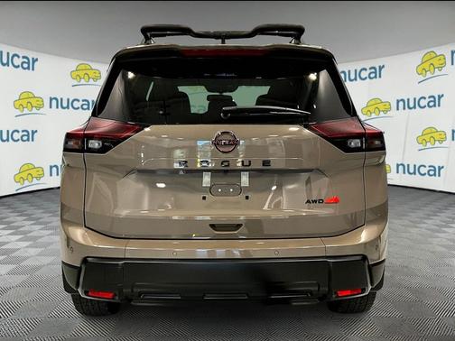 Beige/tan 2026 Nissan Rogue Rock Creek