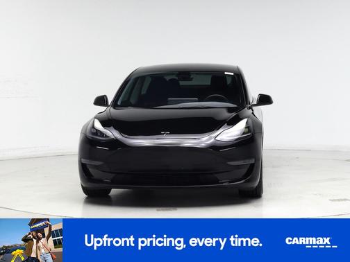 Black 2023 Tesla Model 3