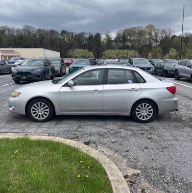 Spark Silver Metallic 2010 Subaru Impreza 2.5 i Premium