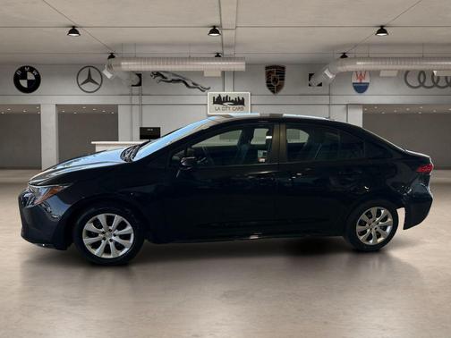 Midnight Black Metallic 2025 Toyota Corolla LE