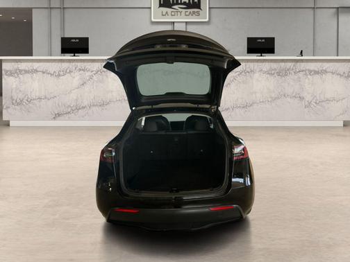 Solid Black 2023 Tesla Model Y Performance Dual Motor All-Wheel Drive