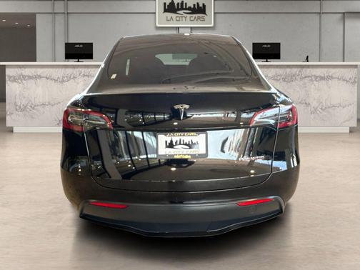 Solid Black 2023 Tesla Model Y Performance Dual Motor All-Wheel Drive