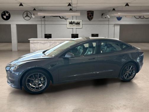 Solid Black 2023 Tesla Model 3 Standard Range