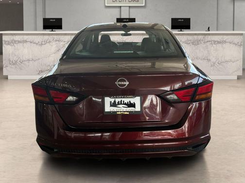 Garnet Pearl Metallic 2025 Nissan Altima 2.5 SV