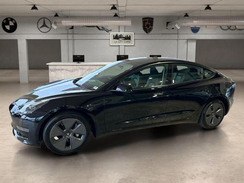 Solid Black 2023 Tesla Model 3 Standard Range