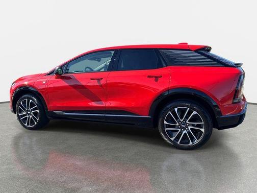 Orange 2025 Cadillac OPTIQ Sport