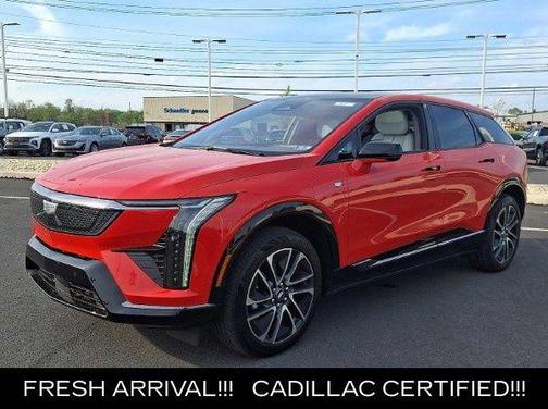 Orange 2025 Cadillac OPTIQ Sport