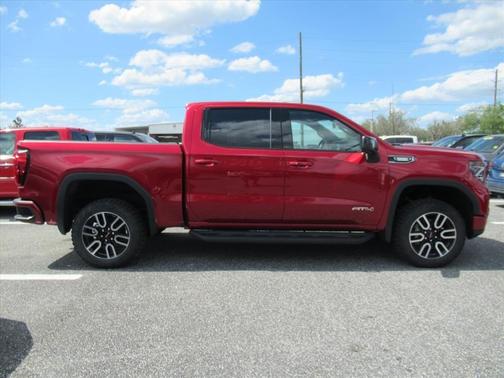 Volcanic Red 2026 GMC Sierra 1500 AT4