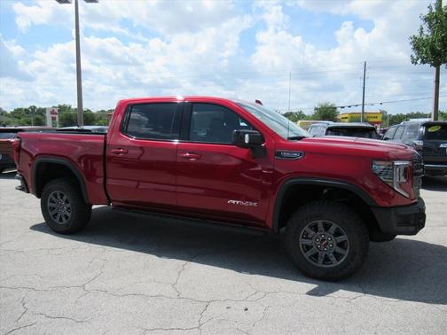 Volcanic Red 2026 GMC Sierra 1500 AT4X