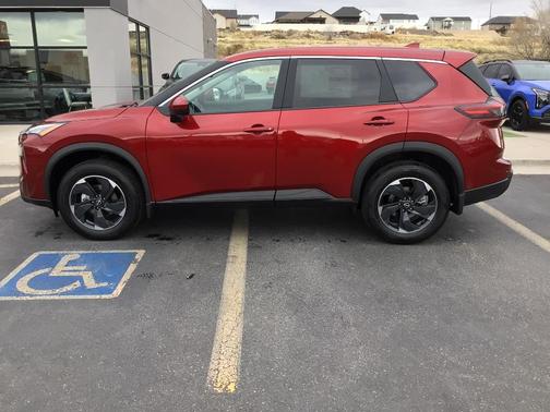 Scarlet Ember 2026 Nissan Rogue SV