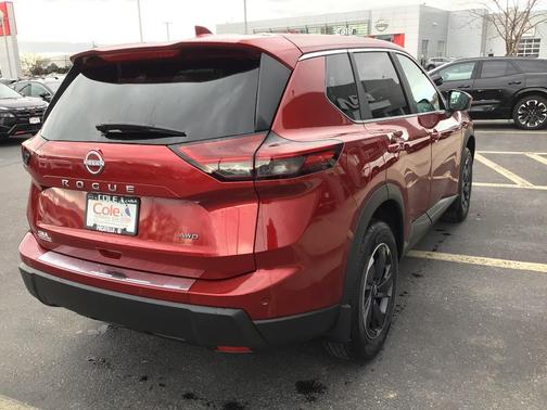 Scarlet Ember 2026 Nissan Rogue SV