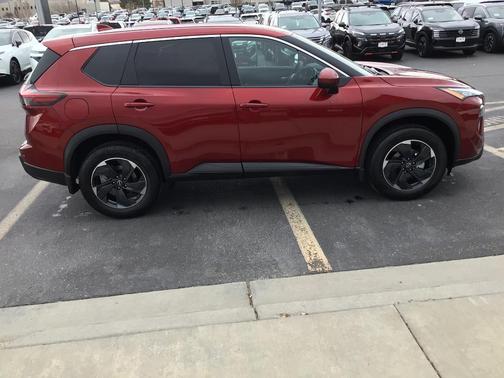 Scarlet Ember 2026 Nissan Rogue SV