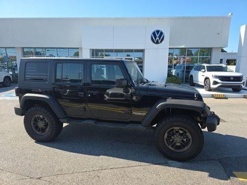 Black 2013 Jeep Wrangler Unlimited Sport