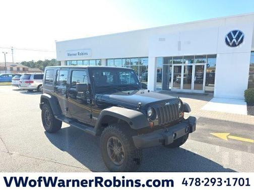 Black 2013 Jeep Wrangler Unlimited Sport