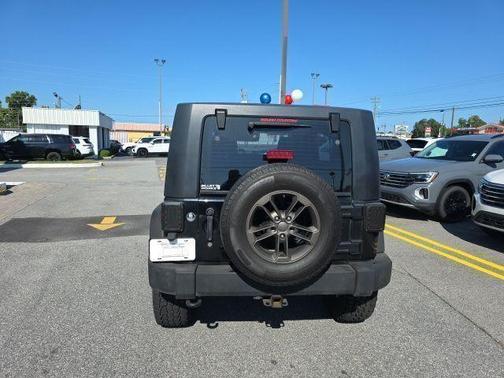 Black 2013 Jeep Wrangler Unlimited Sport