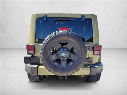 Commando Green 2013 Jeep Wrangler Unlimited Sahara