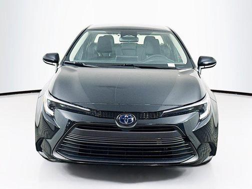 Midnight Black Metallic 2025 Toyota Corolla Hybrid LE