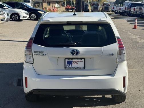 White 2016 Toyota Prius v Three