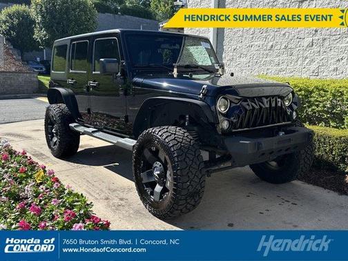 Black Clearcoat 2015 Jeep Wrangler Unlimited Sahara