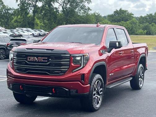 Volcanic Red Tintcoat 2026 GMC Sierra 1500 AT4