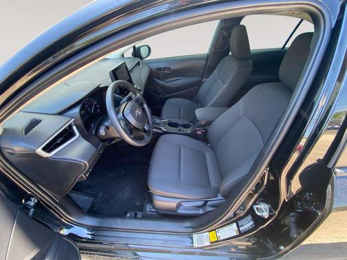 Midnight Black Metallic 2025 Toyota Corolla Hybrid LE