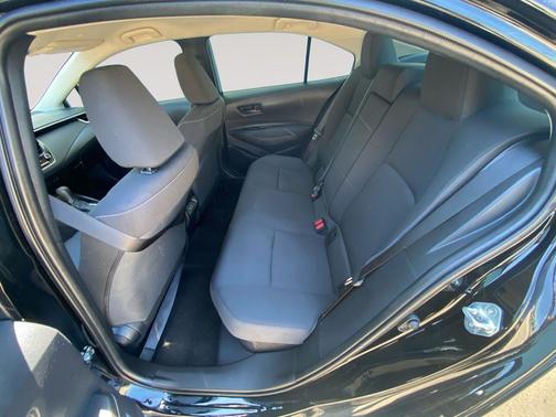 Midnight Black Metallic 2025 Toyota Corolla Hybrid LE
